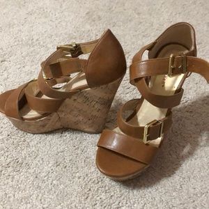 Tan wedges with gold buckles